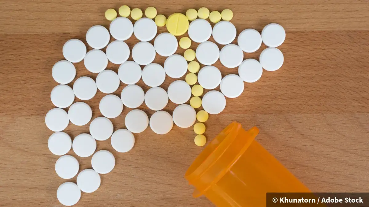 paracetamol pills on a table, in the shape of a liver
