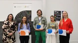 Poster prize winners Laura Quesada Ojeda (first prize), Sam Benson, Bethan Rowley and Rosie Willis with Dr Elaine Emmerson