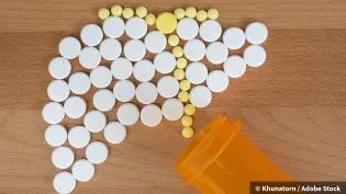 paracetamol pills on a table, in the shape of a liver