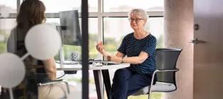 Clinician in a consultation with a patient