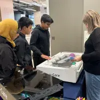 Children looking at laser pointer game