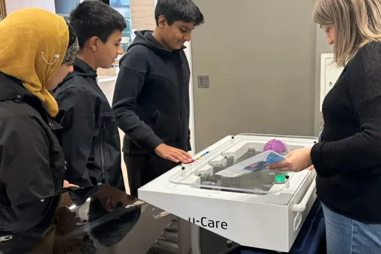Children looking at laser pointer game