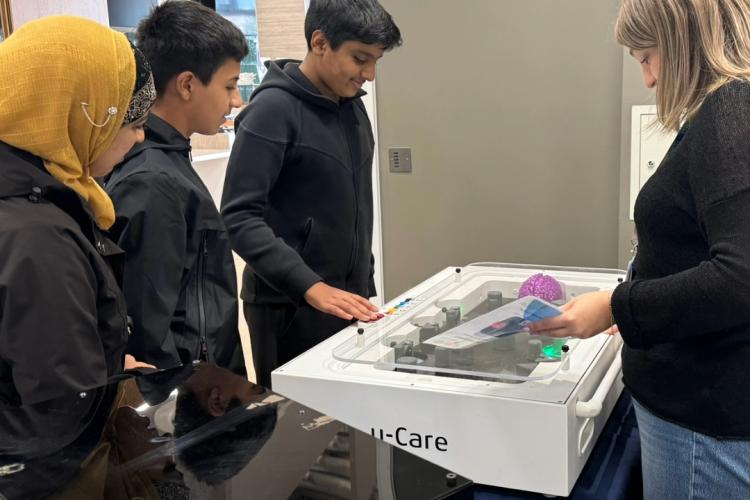 Children looking at laser pointer game