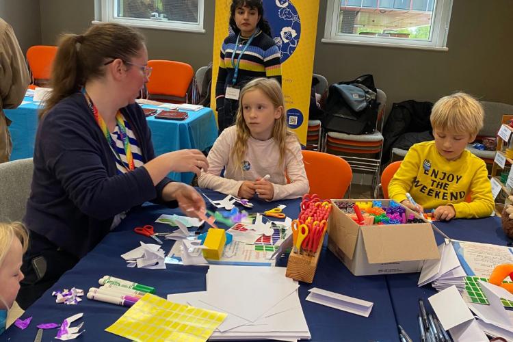 Children engaging in table activity