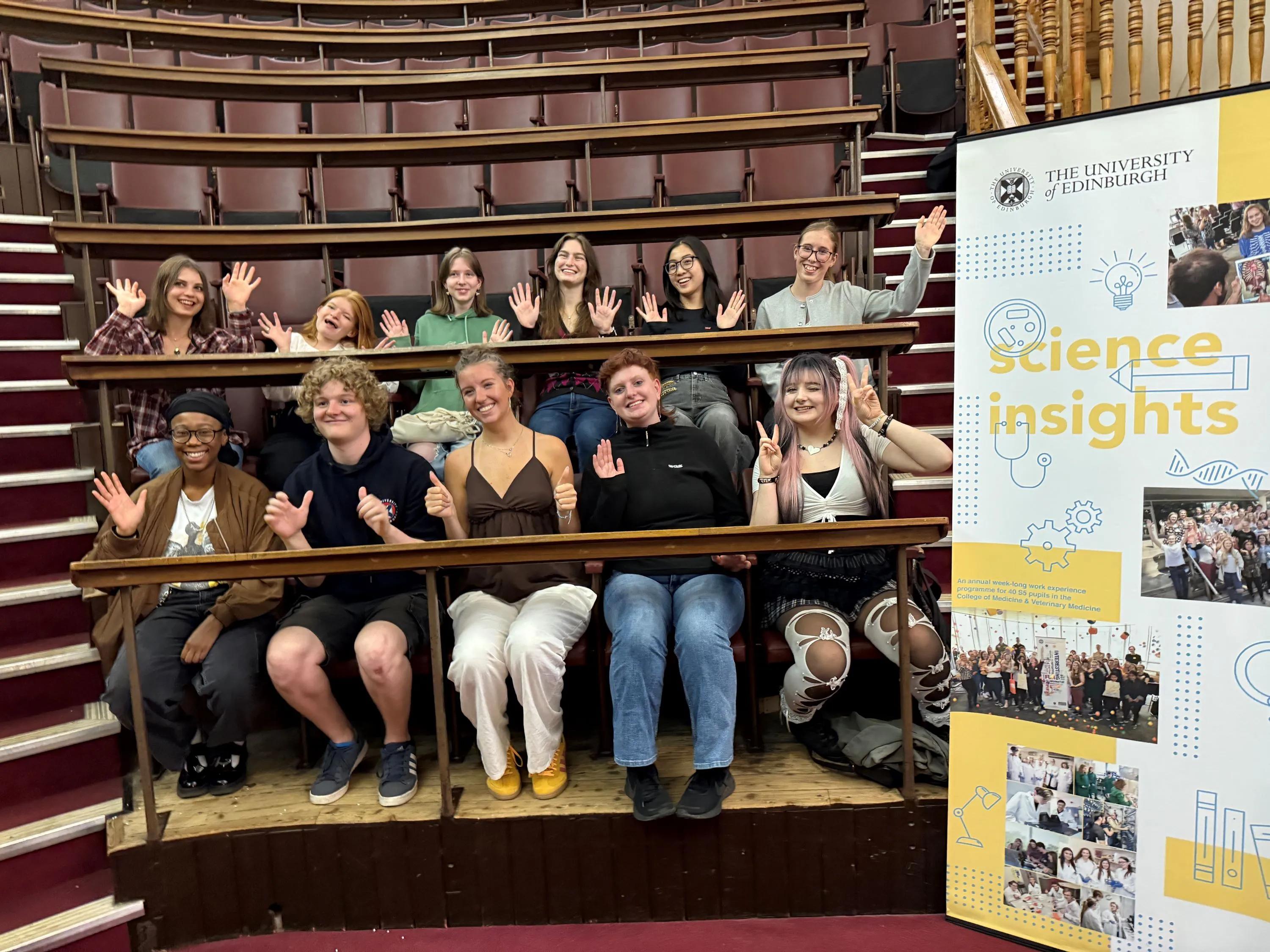 Group photo of Science Insights alumni in the anatomy lecture theatre