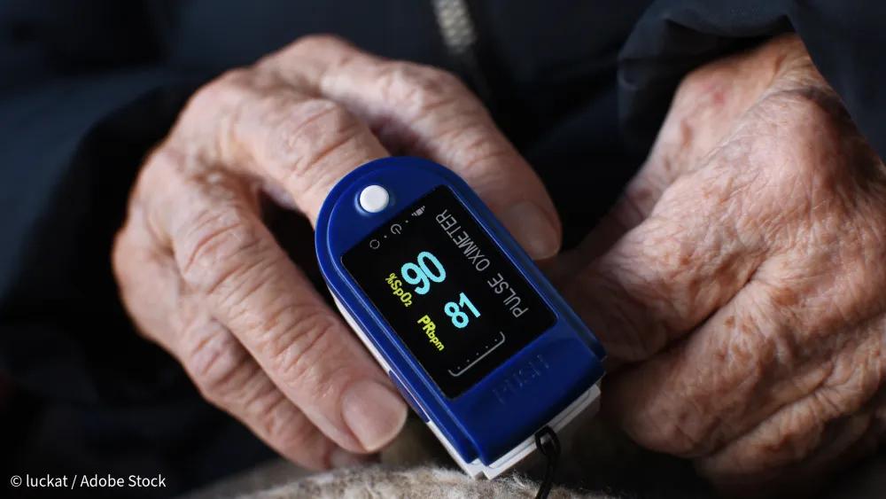 Device that measures blood oxygen levels on the finger of an elderly individual
