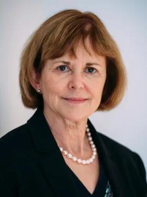 a portrait of Professor Moira Whyte, wearing a dark jacket