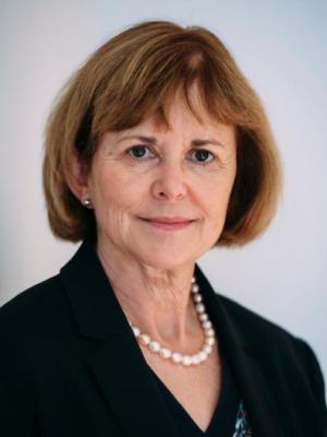 a portrait of Professor Moira Whyte, wearing a dark jacket