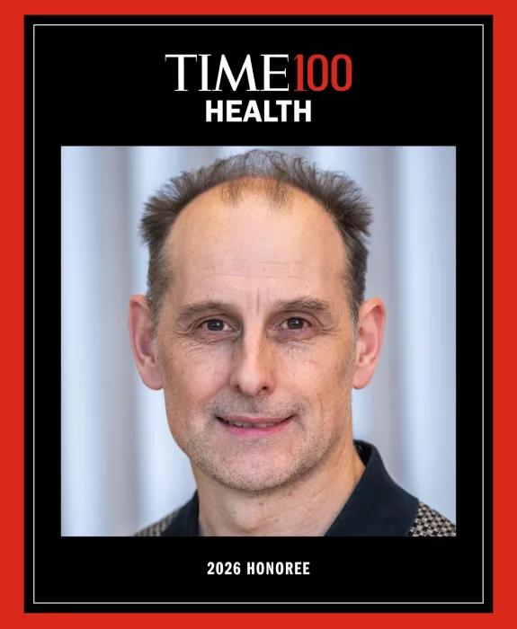 a photograph of Brian Bigger on a black background with a red border, text reads "TIME100 Health 2026 Honoree"